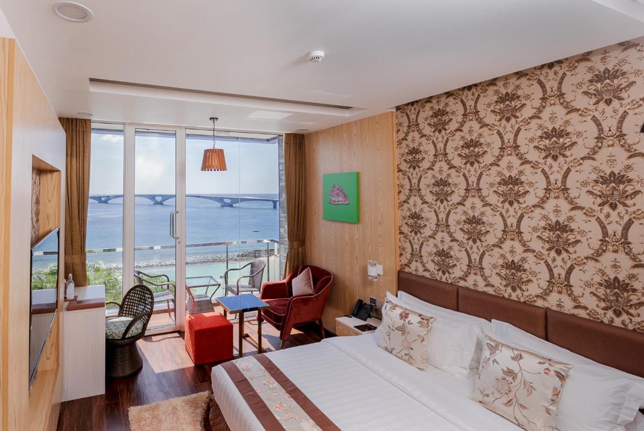 Deluxe Double Room Balcony Sea View Return Airport Transfer on Food & Beverage